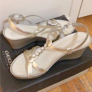 Silver bejewelled wedge heels